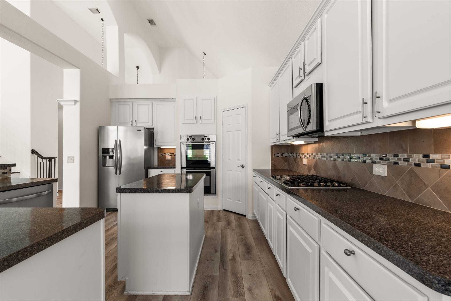23218 Colony Green Drive, Katy, TX 77494 Gourmet kitchen with large island & stainless steel appliances.