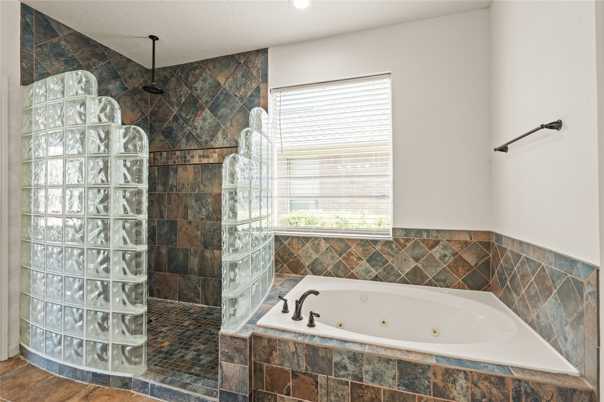 23218 Colony Green Drive, Katy, TX 77494 Walk-in shower & soaking bath tub in primary en suite.
