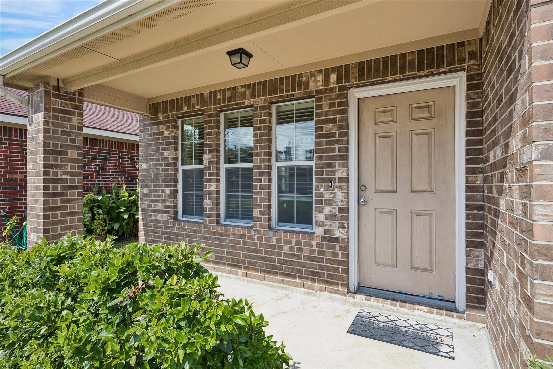 Enjoy outdoor relaxation on the inviting covered patio