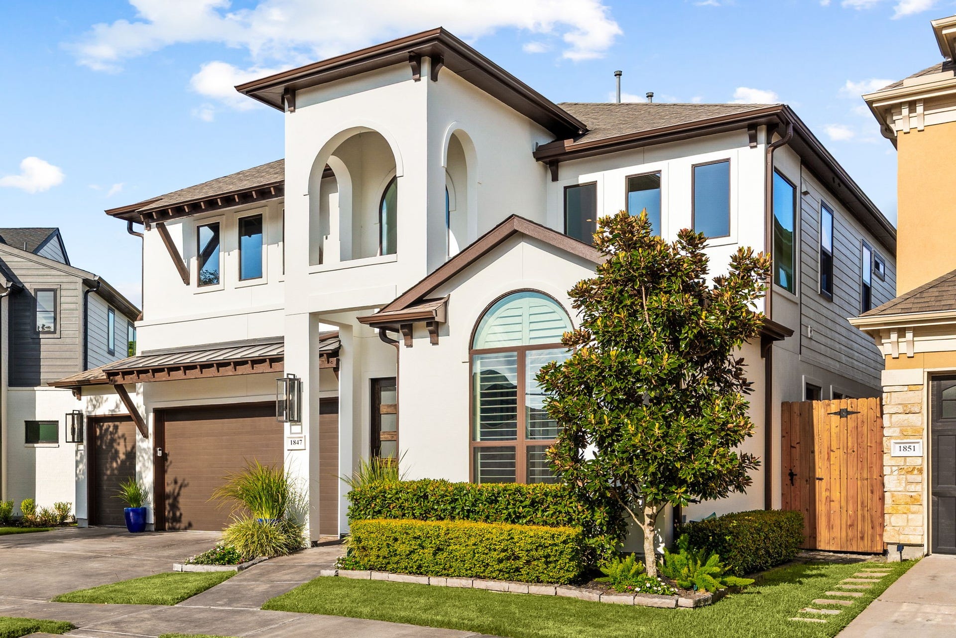 1847 Candlelight Place Drive, Houston, TX 77018 Wonderful elevation with freshly painted and sealed white stucco all around. THREE CAR GARAGE