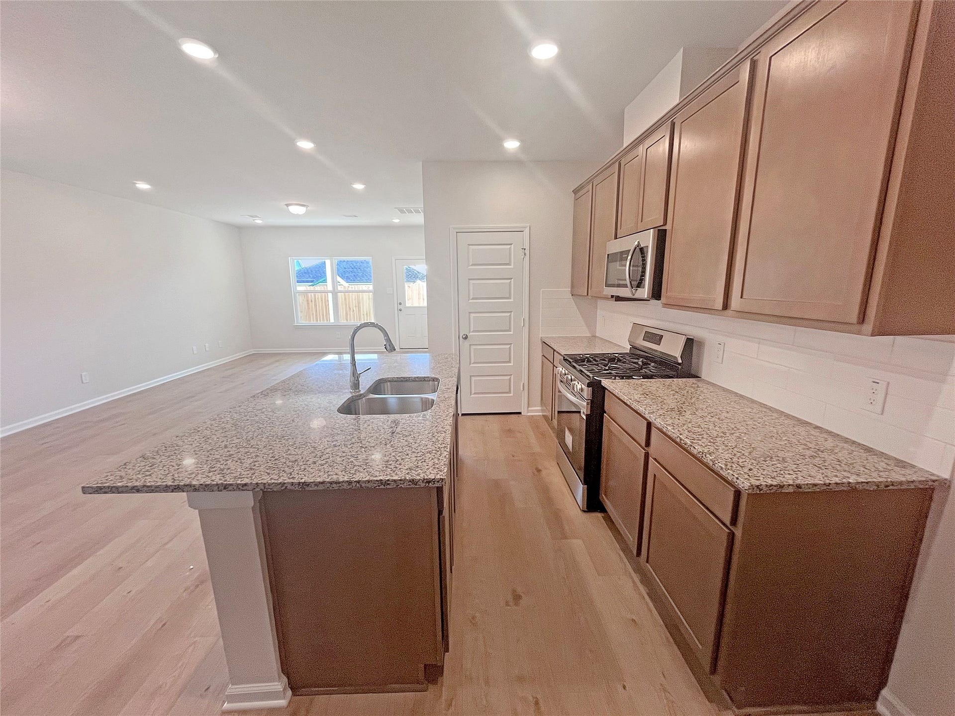 649 Cherry Tree Drive, La Marque, TX 77568 The Robin II- Kitchen. Sample image to be used for example only, colors, options and upgrades vary.