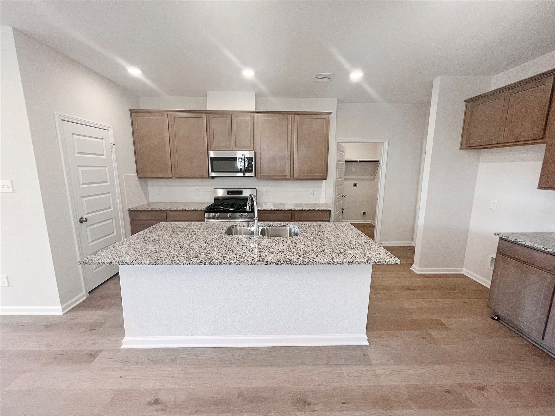 649 Cherry Tree Drive, La Marque, TX 77568 The Robin II- Kitchen. Sample image to be used for example only, colors, options and upgrades vary.