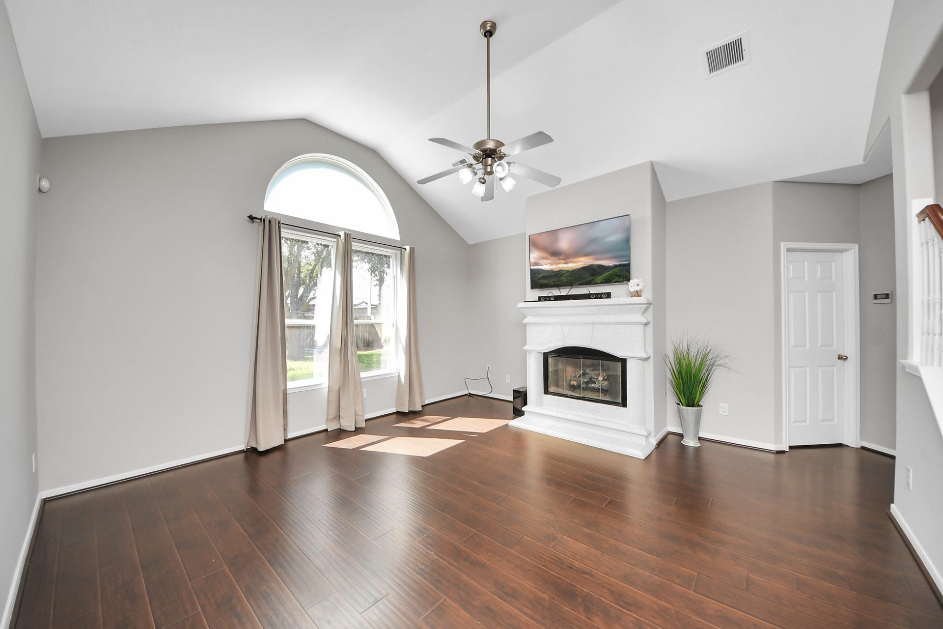 6114 Hollydale Ridge Lane, Katy, TX 77494 High ceilings featuring a gas fireplace