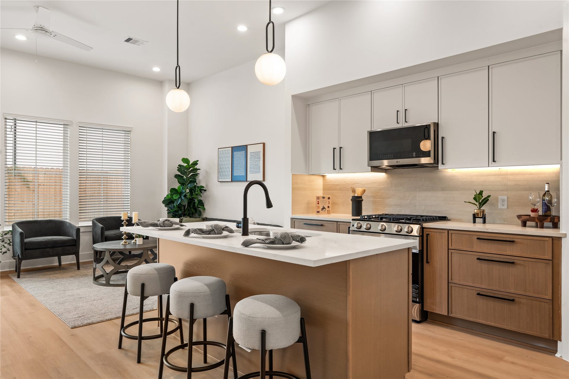 4615 Buck Street, Houston, TX 77020 Modern kitchen workflow featuring soft-close cabinetry, a gas range, and task lighting.
