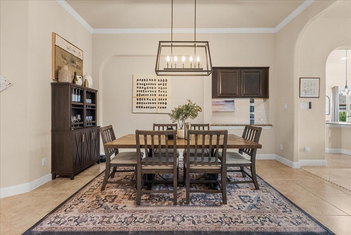 1413 Coffee Mill Court, League City, TX 77573 The formal dining area is conveniently located just off the living room and kitchen, creating a seamless flow thats perfect for both everyday living and entertaining.