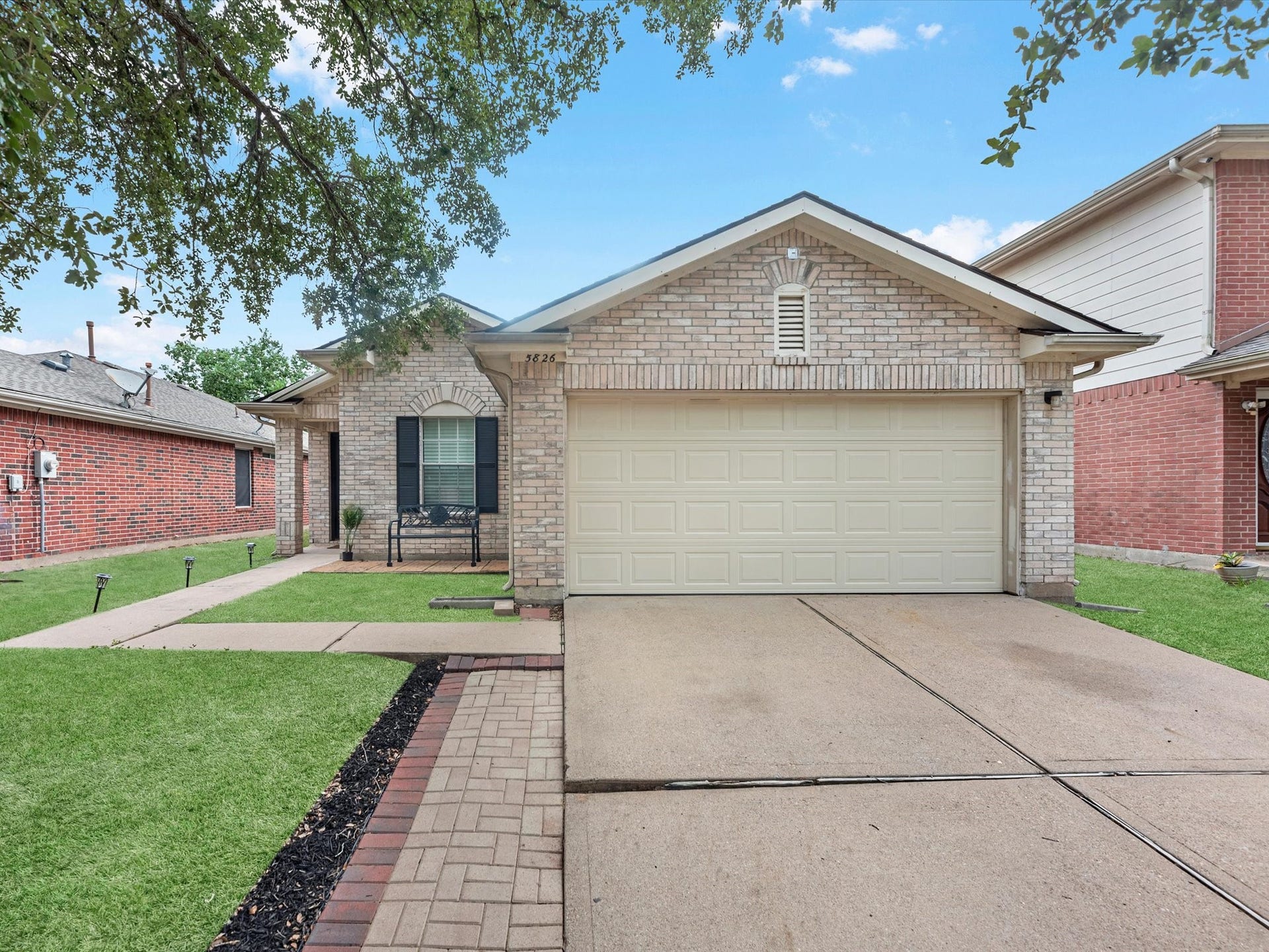 Welcome Home! Enjoy this long driveway that gives you plenty of space for hosting!