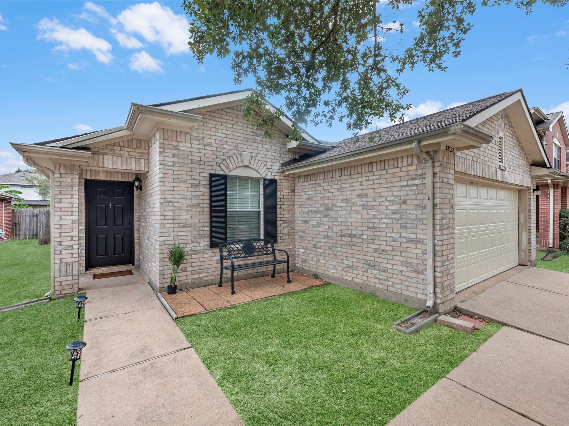 Enjoy this cute front porch to relax or have a morning cup of coffee