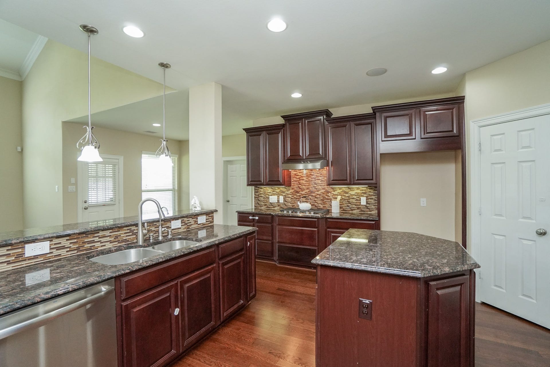 3434 Norwich Gardens Lane, Fulshear, TX 77441 Abundant cabinet & Counter Space for storage, meal prep and entertaining.