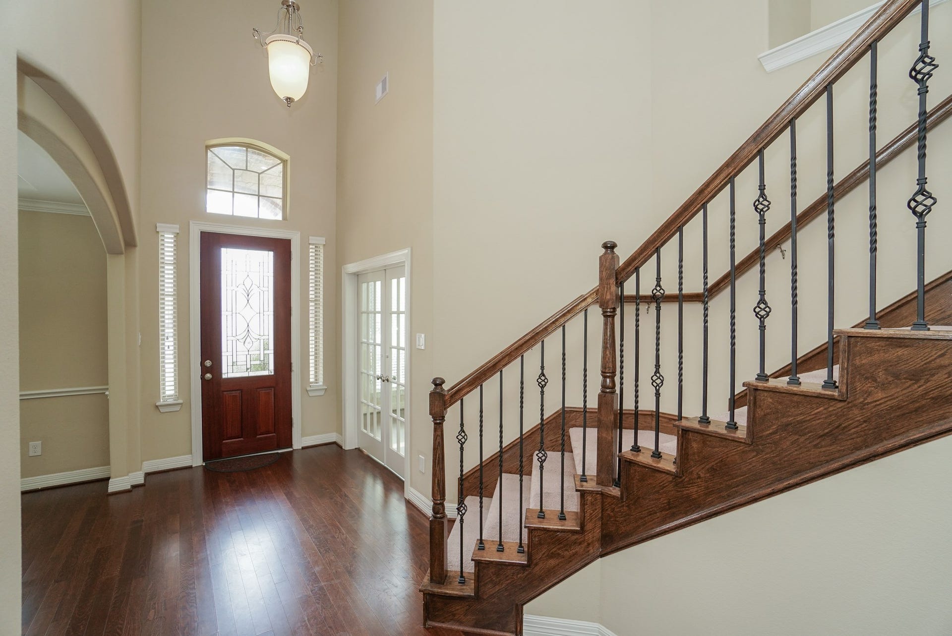 3434 Norwich Gardens Lane, Fulshear, TX 77441 Hardwood floors and carpet on the stairs will greet you at the front door.