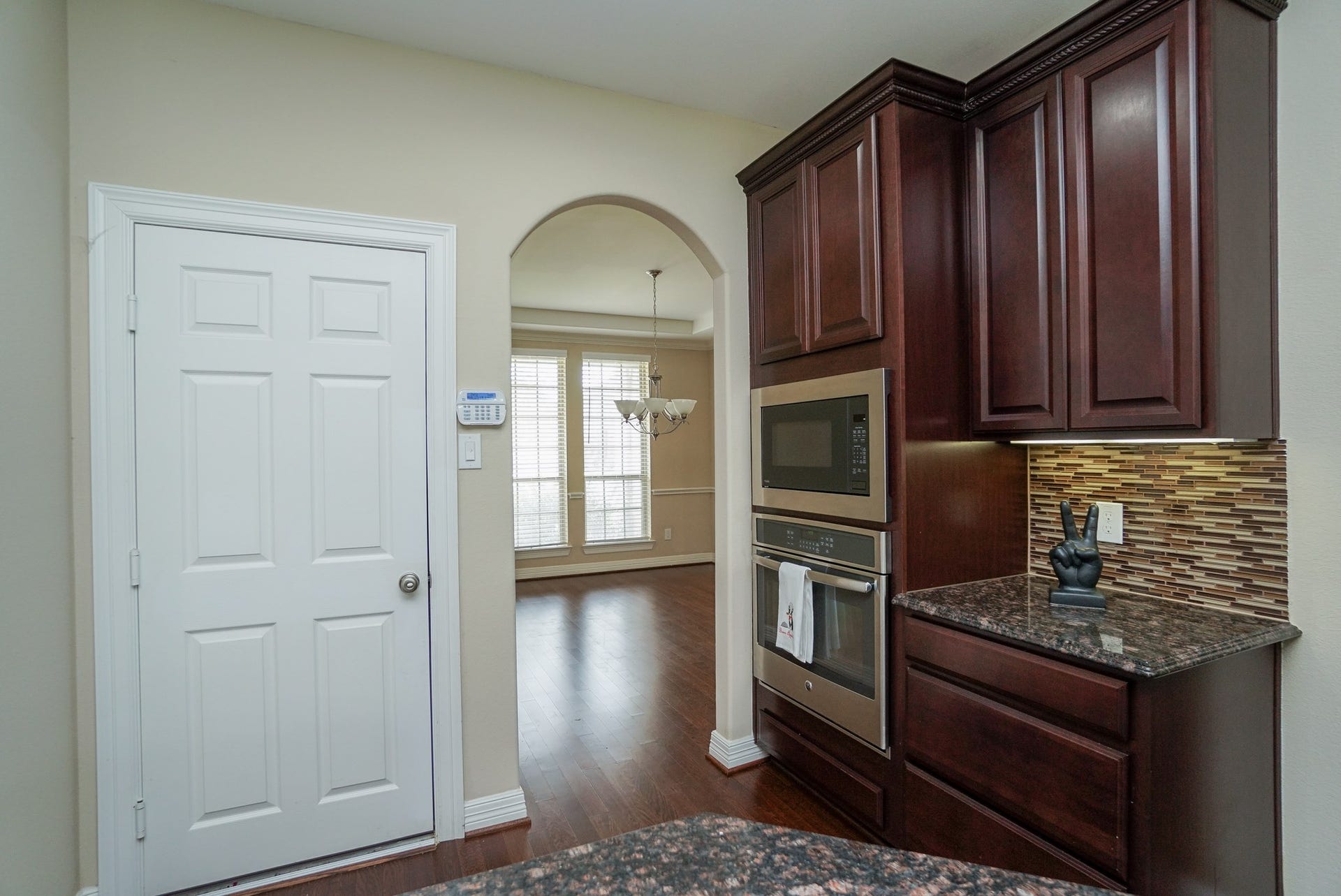 3434 Norwich Gardens Lane, Fulshear, TX 77441 The door you see in this picture is the pantry!