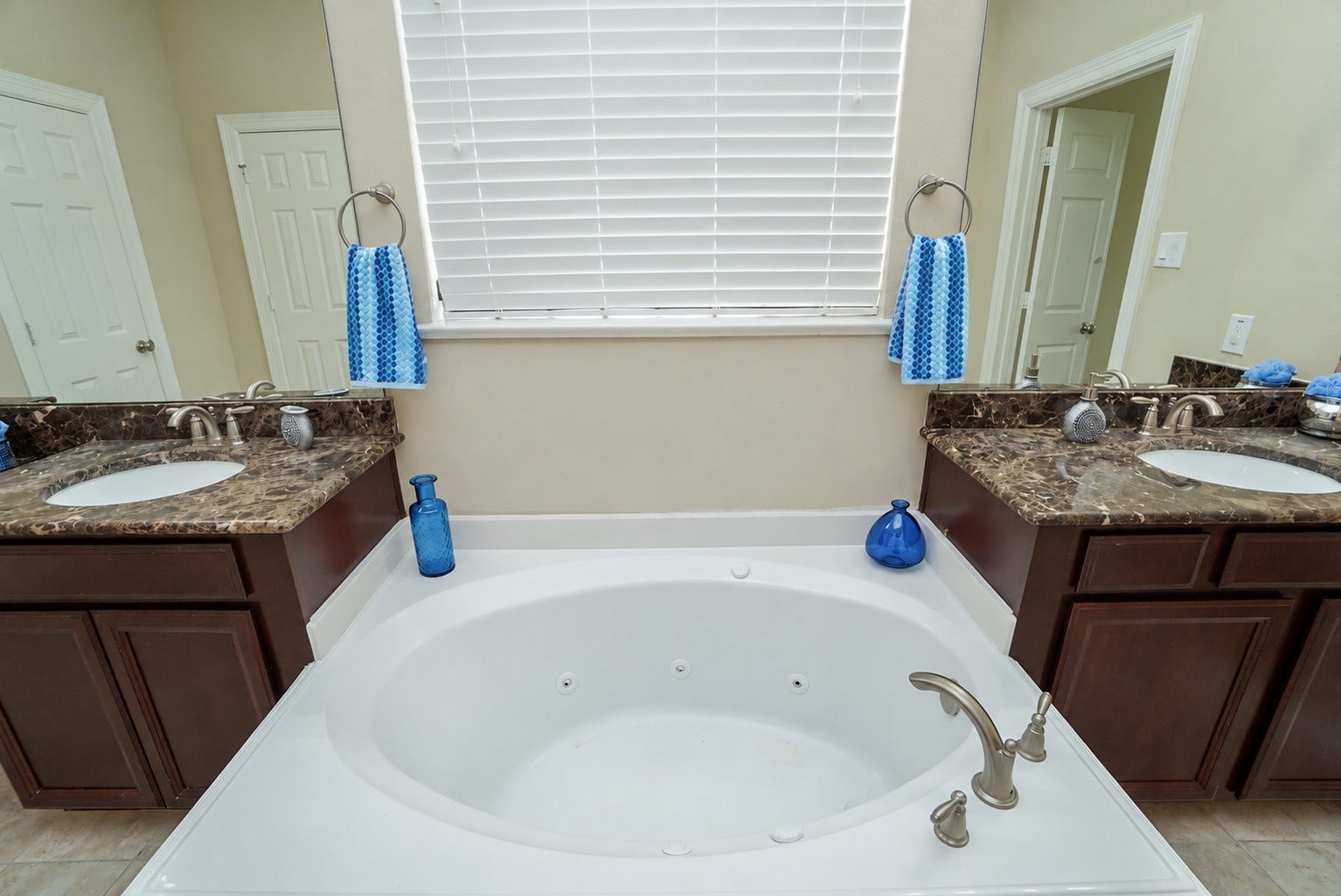 3434 Norwich Gardens Lane, Fulshear, TX 77441 Large soaking tub is the focal point of this primary bathroom.