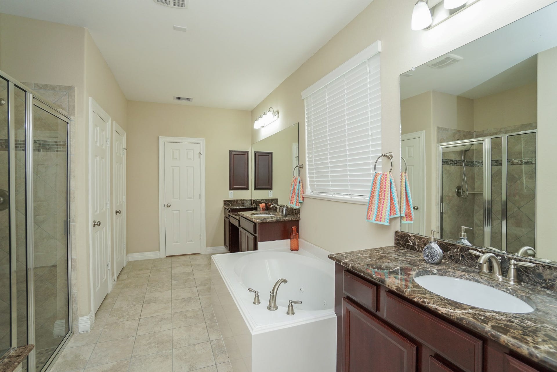 3434 Norwich Gardens Lane, Fulshear, TX 77441 Wow!! Seperate shower and bath, dual vanities, and lots of storage for your all our needs are sure to impress.