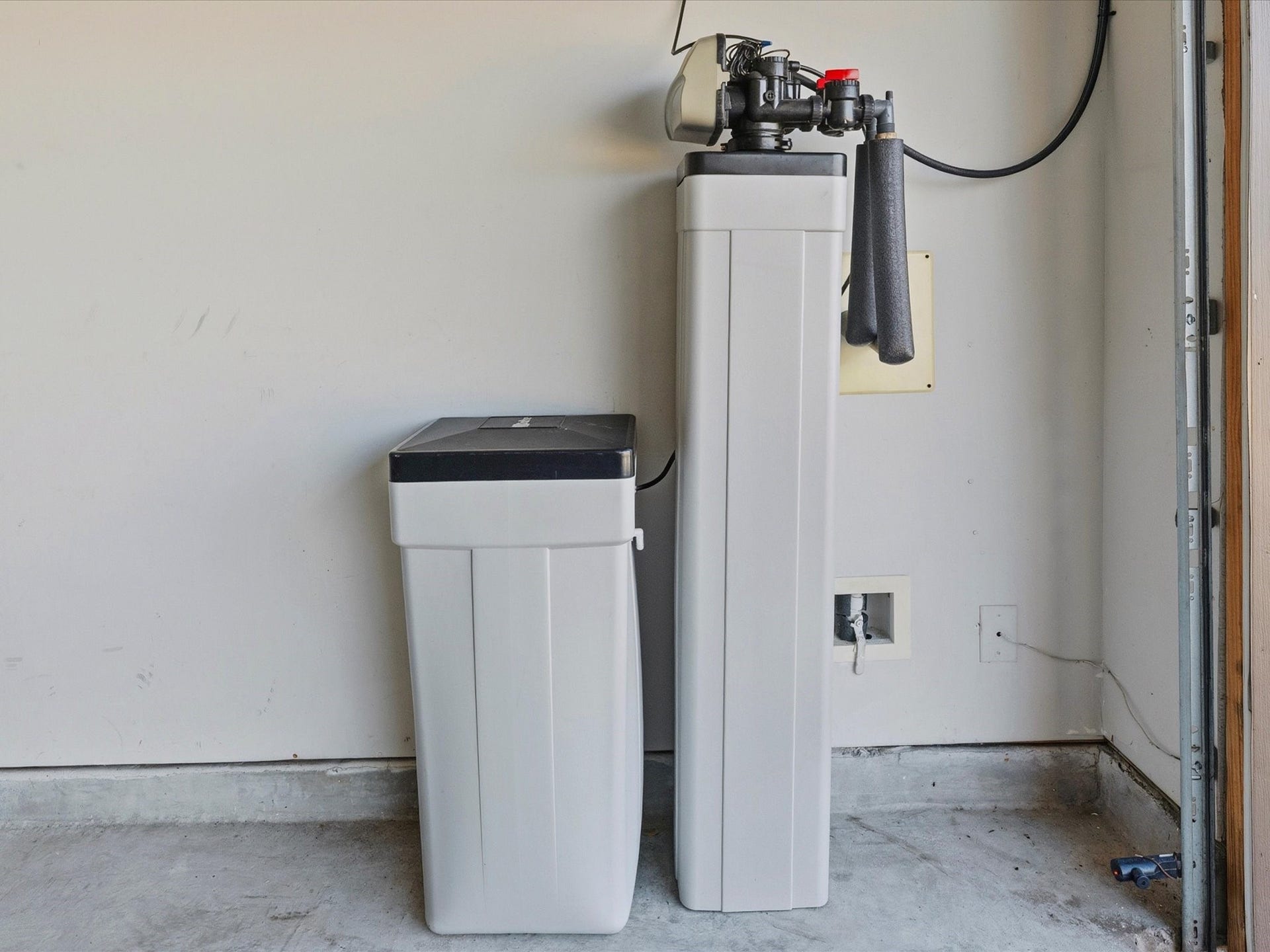 3519 Mcdonough Way, Katy, TX 77494 Located safely in the garage, a whole house water softener system.