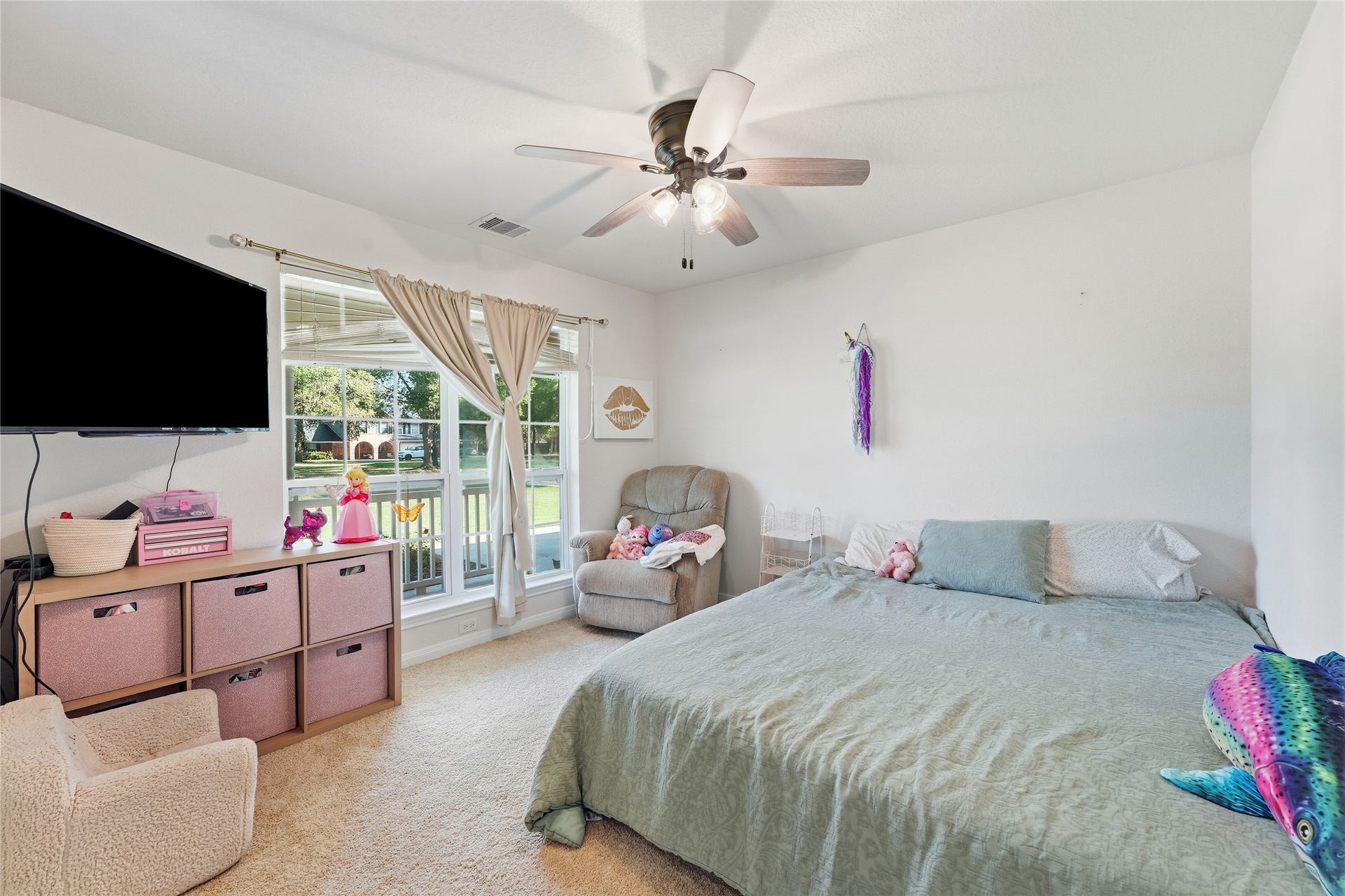 10711 Indian Trails Drive, Tomball, TX 77375 This secondary bedroom offers plenty of natural light and new carpet.