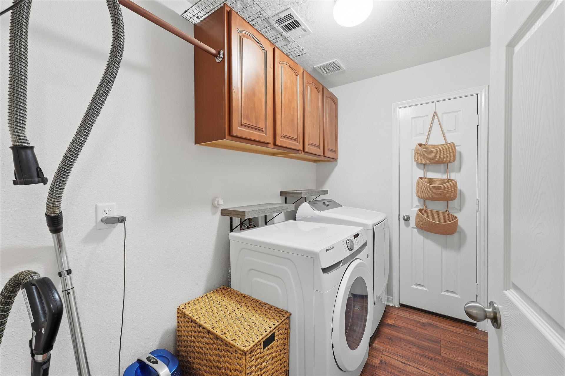 10711 Indian Trails Drive, Tomball, TX 77375 Large laundry room with plenty of storage.