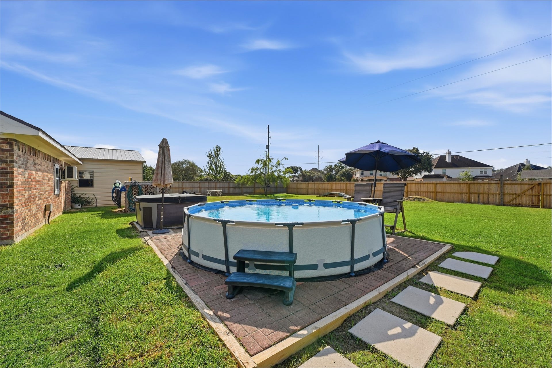 10711 Indian Trails Drive, Tomball, TX 77375 The above-ground pool is included in the saleready for relaxing and cooling off on warm days.