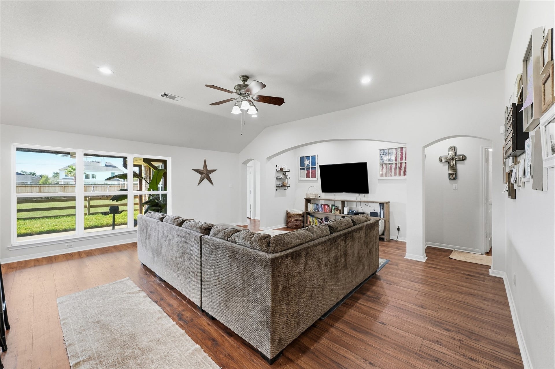 10711 Indian Trails Drive, Tomball, TX 77375 This spacious family room features brand-new LVP flooringa durable, easy-care surface for everyday living and entertaining.