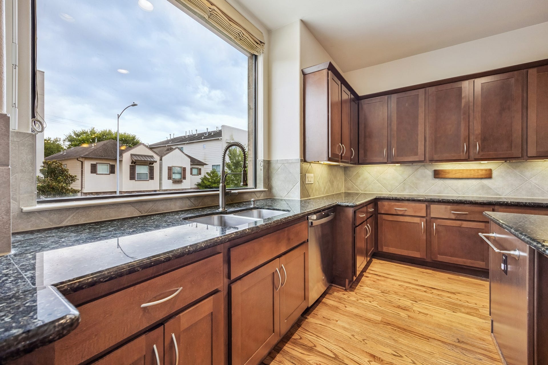 4414 Floyd Street, Houston, TX 77007 A huge picture frame window overlooks Rice Military