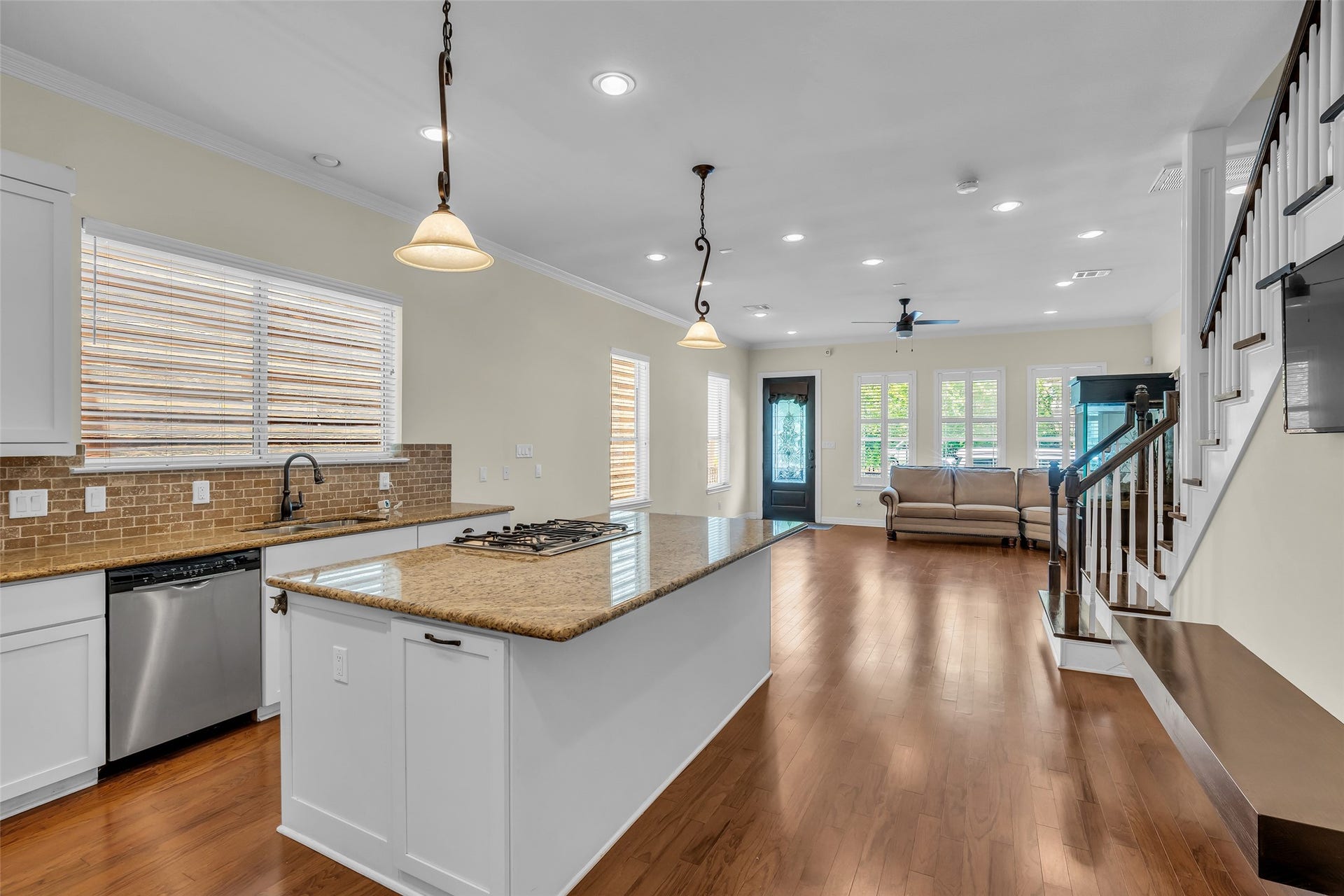 1423 Colorado Street, Houston, TX 77007 View from the kitchen extends all the way to the end of the living room, highlighting the open layout and continuous flow between the main living spaces.