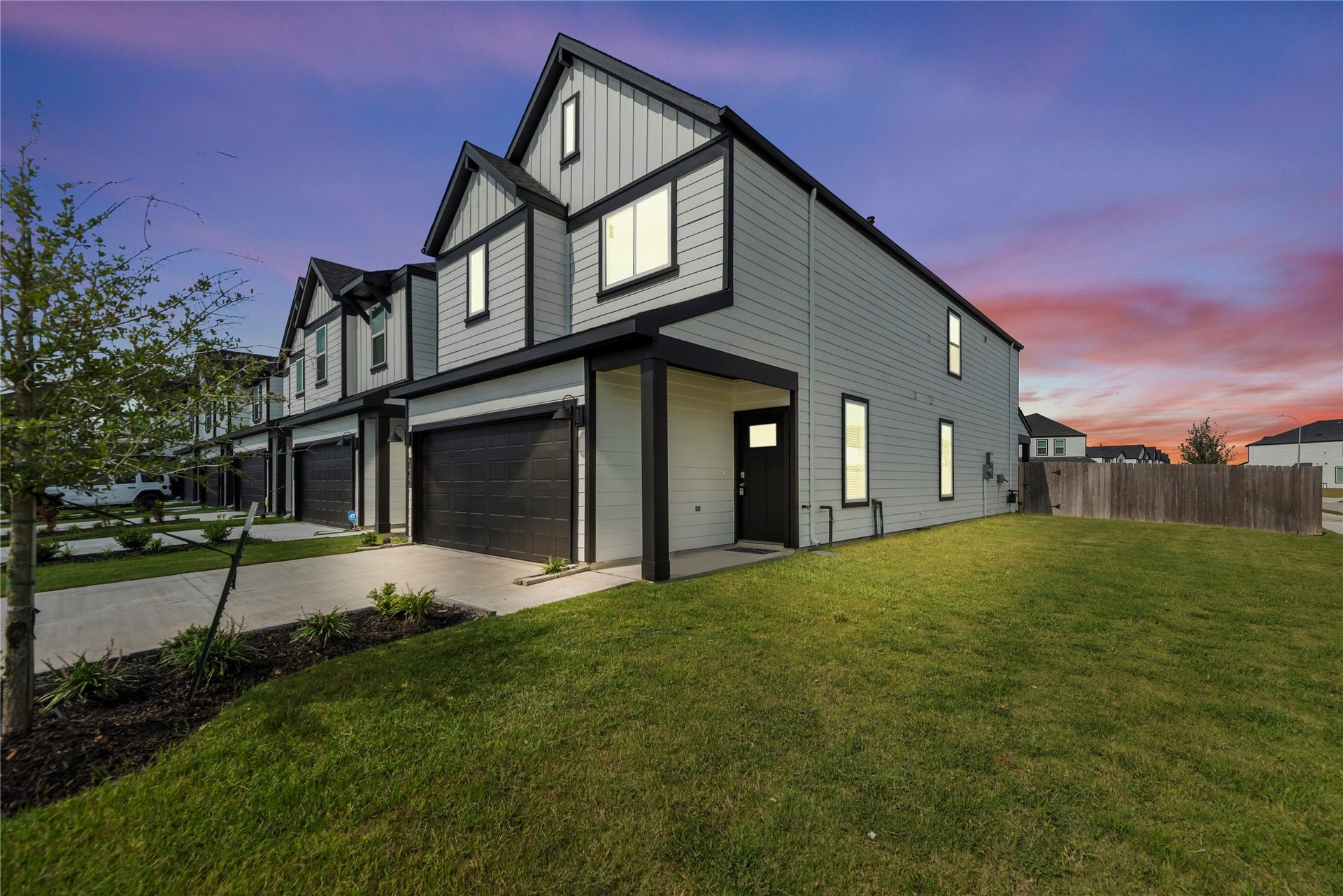 12302 Greenwood Gate Drive, Houston, TX 77047 Welcome to 12302 Greenwood Gate Dr - Striking curb appeal with modern architecture and bold black accents, this corner-lot home features a spacious two-car garage, covered entryway, and a beautifully maintained front lawnall framed by a gorgeous sunset backdrop.