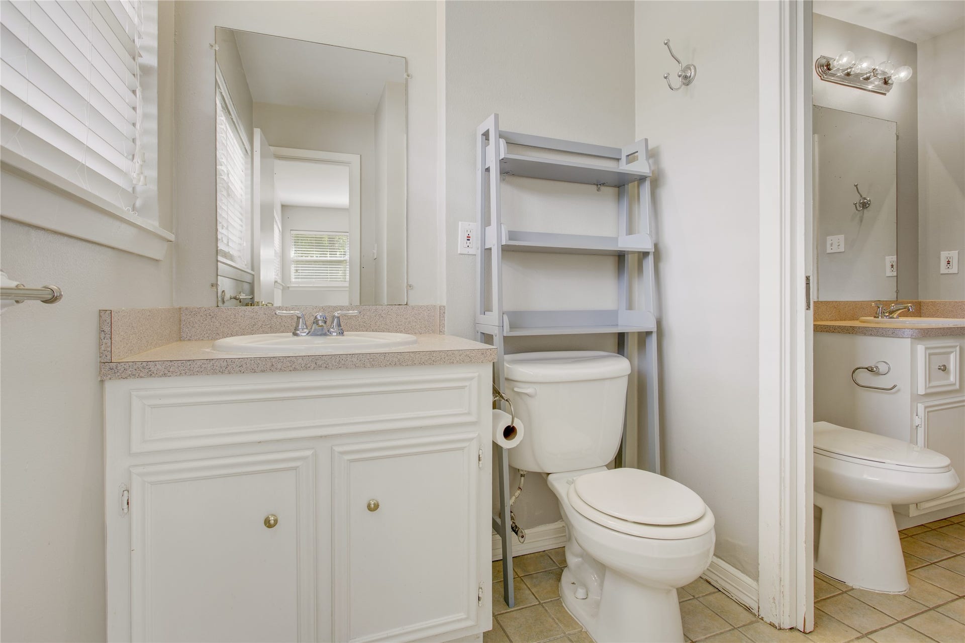 4314 Benning Drive, Houston, TX 77035 Primary bath is en suite and is a powder configuration. It opens to the full bath in the hallway.