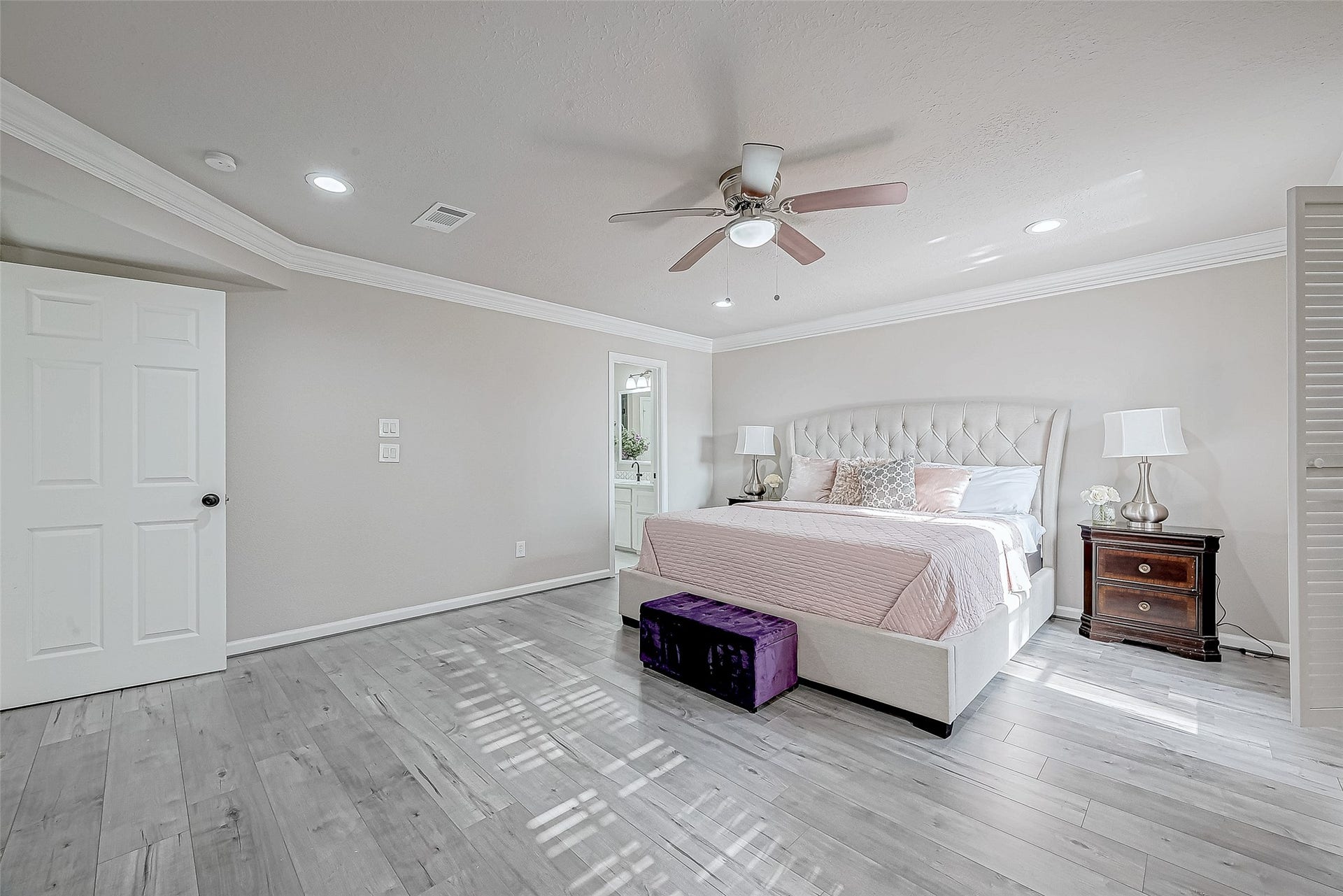 3102 Glenn Lakes Lane, Missouri City, TX 77459 Primary bedroom with elegant finishes and abundant natural light.