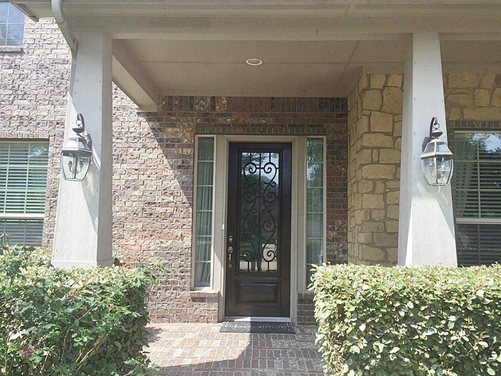 20914 Bright Lake Bend Court, Richmond, TX 77407 The grand elevation and covered front porch are stylish and offer great curb appeal.