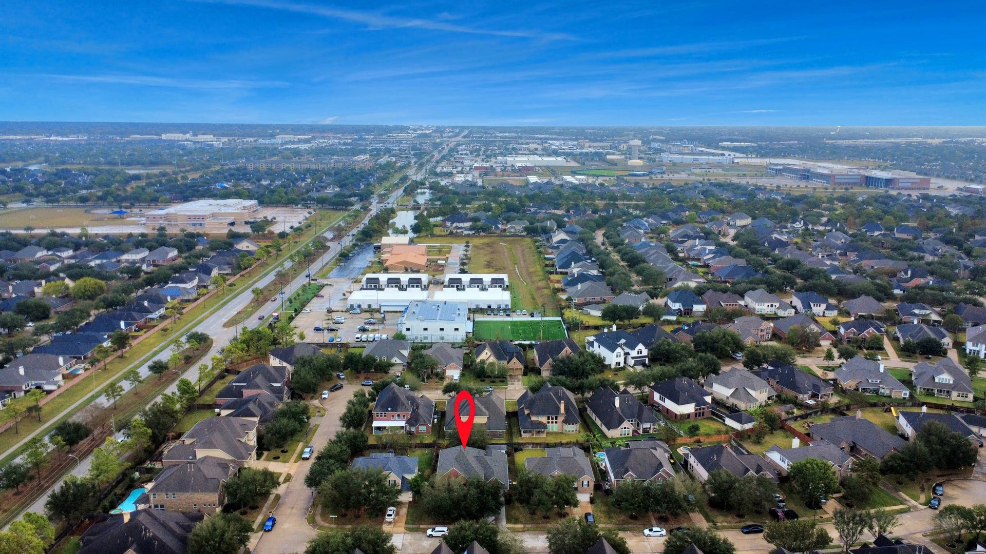 3003 Birch Landing Court, Pearland, TX 77584 A more distant perspective captures the home within its broader setting, pinning its location in the neighborhood landscape and beyond.