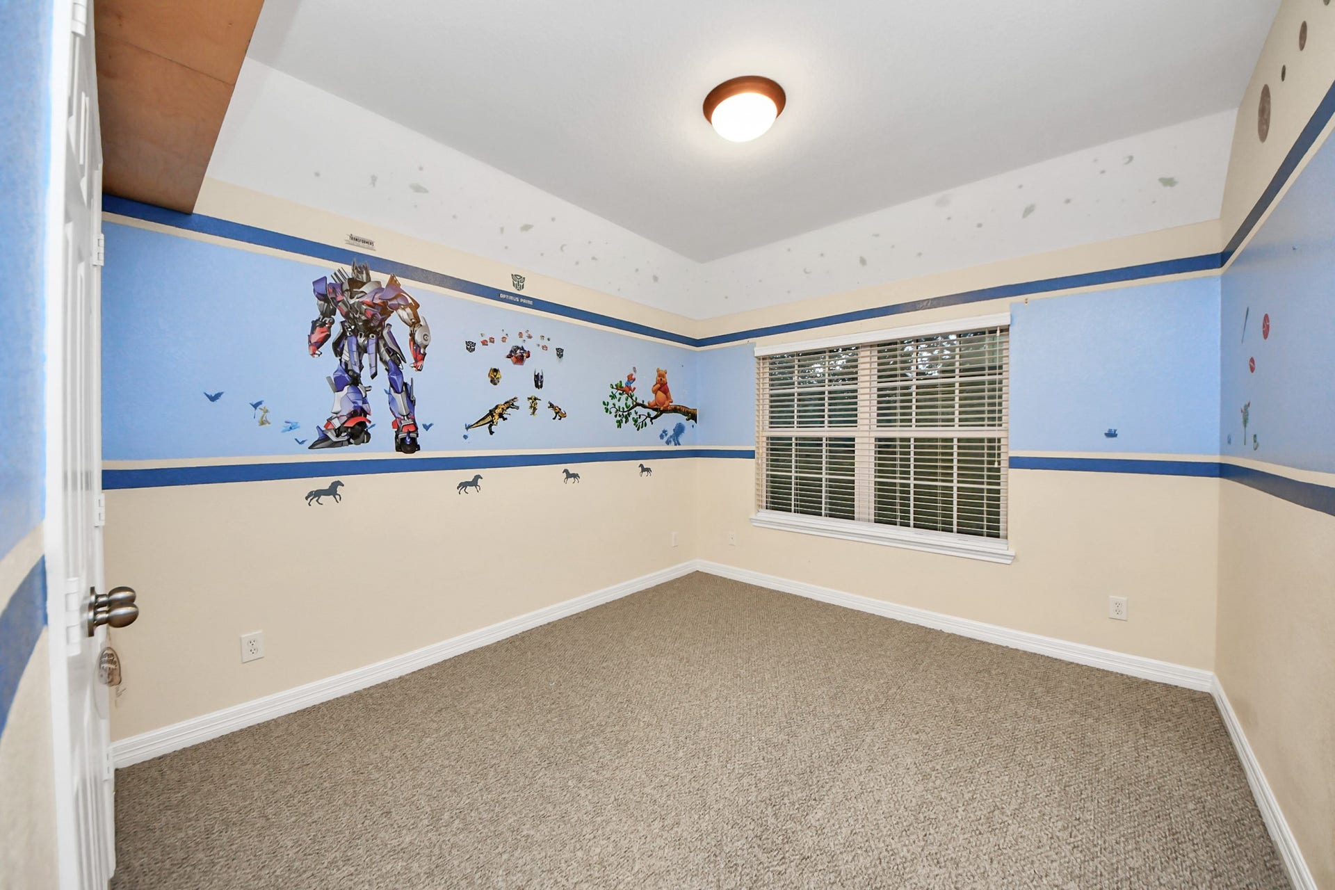 3003 Birch Landing Court, Pearland, TX 77584 The fourth bedroom offers plush comfort, a wide window, and a built-in closetideal for a colorful or creative setup.