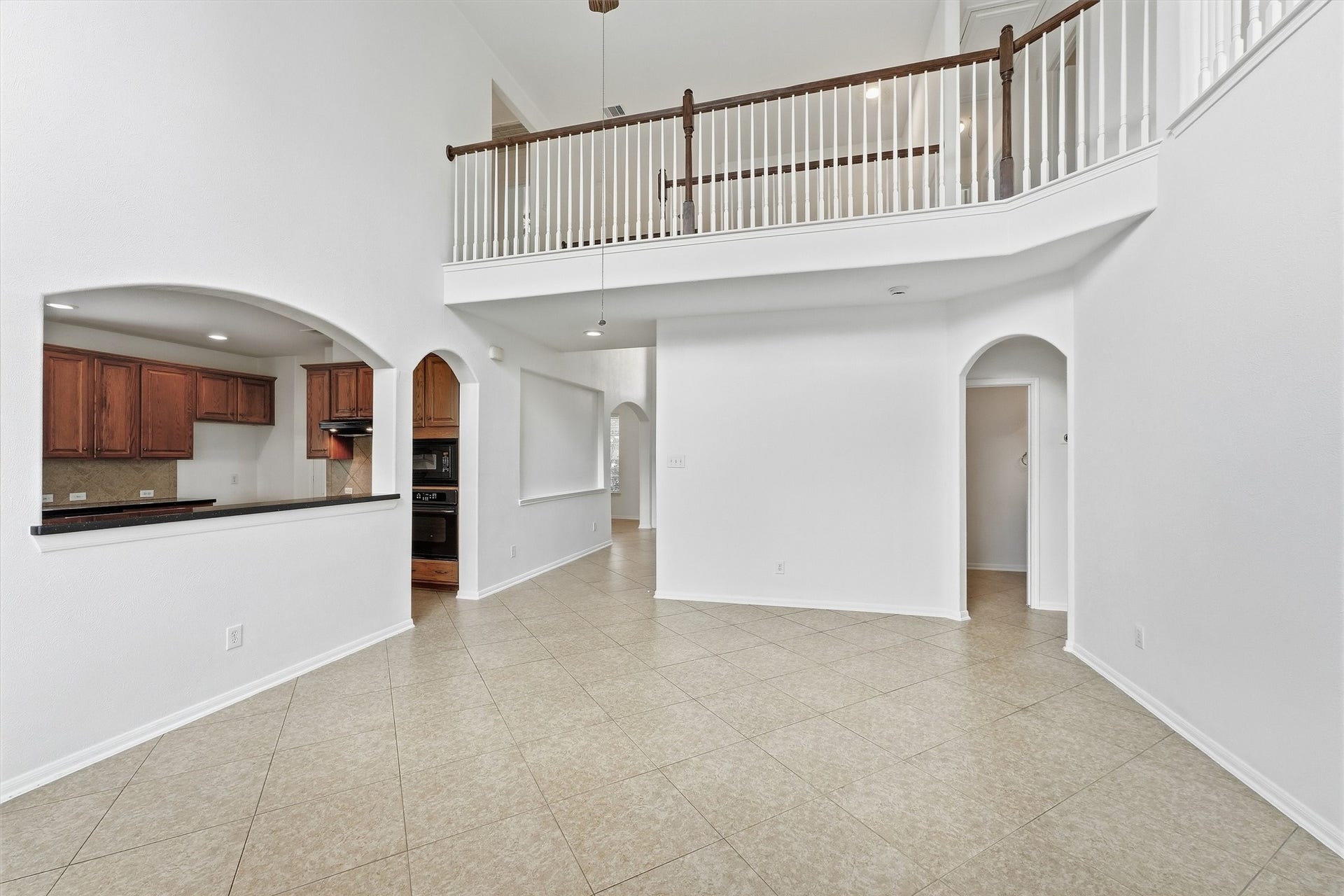 15107 Heron Meadow Lane, Cypress, TX 77429 Living room space #2 - kitchen bar