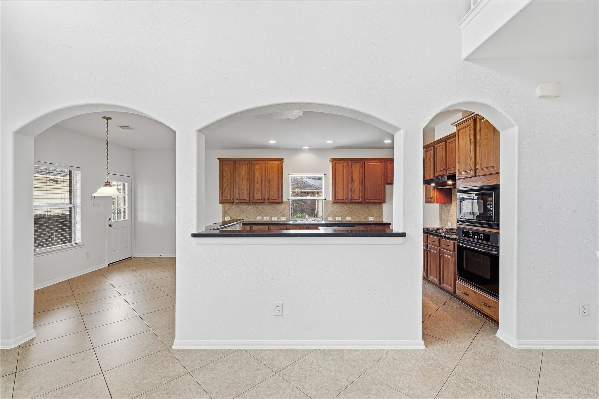 15107 Heron Meadow Lane, Cypress, TX 77429 Kitchen bar - Kitchen opens to living room