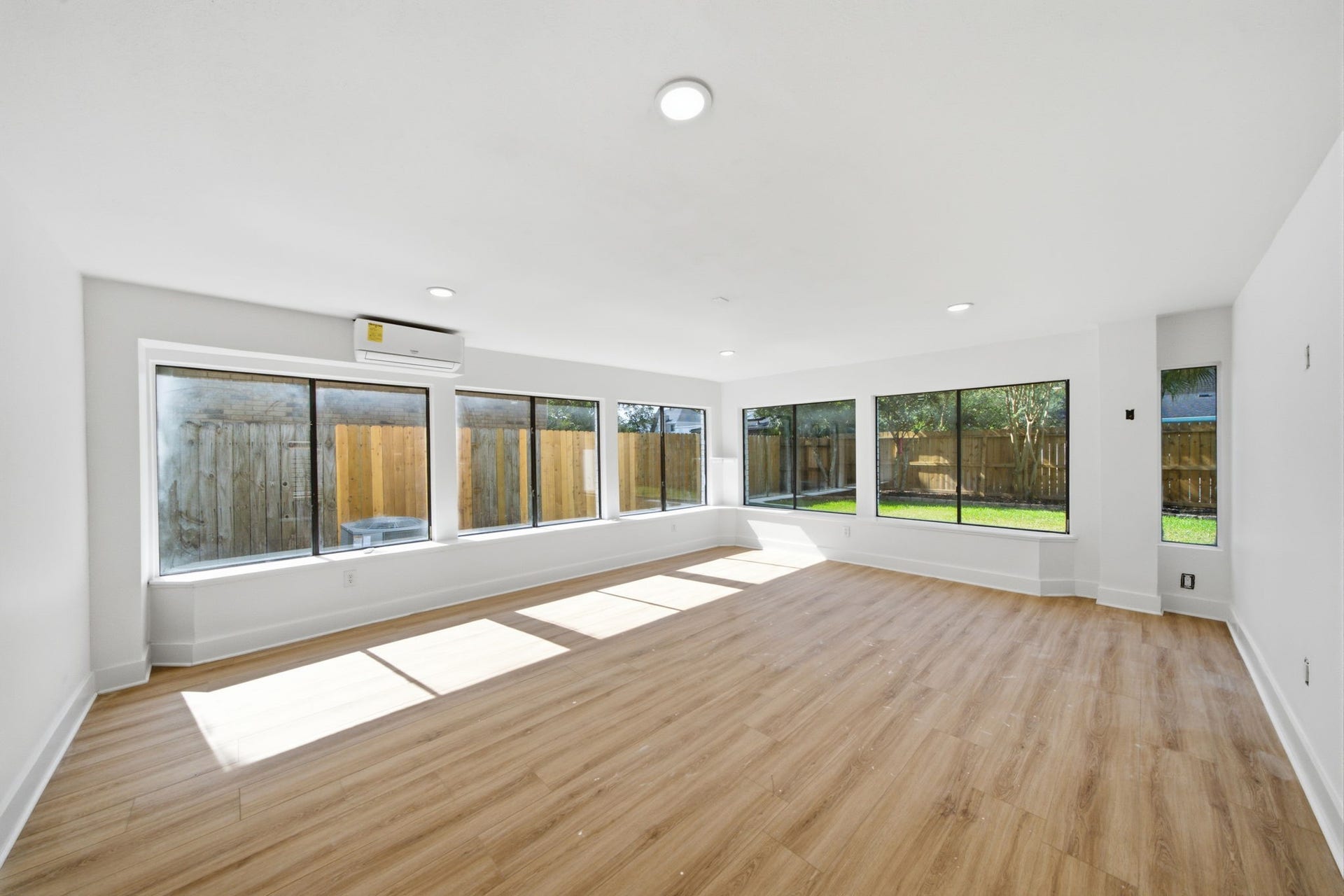 2304 Eagles Way, Pearland, TX 77581 Sun-filled bonus room overlooking the backyard provides versatile space for a gym, studio, playroom, second office or second living area.