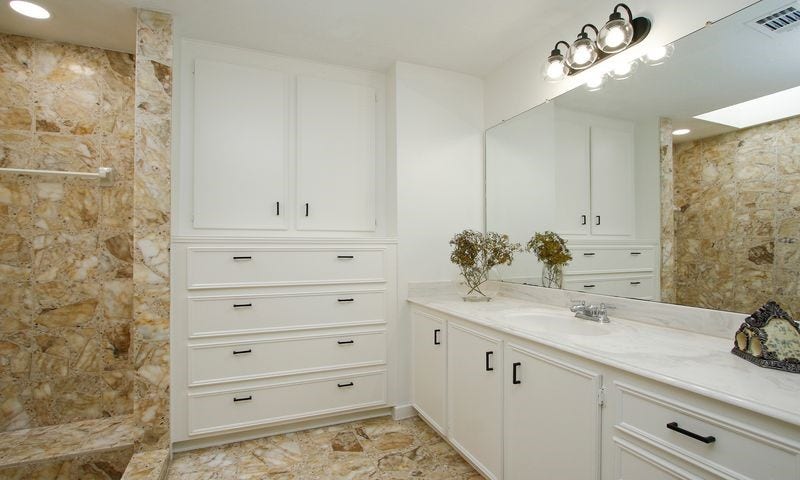 8006 Albin Lane, Houston, TX 77071 magnificent master bath w/his & hers vanities built in chest of drawers and tones of storage for both sides