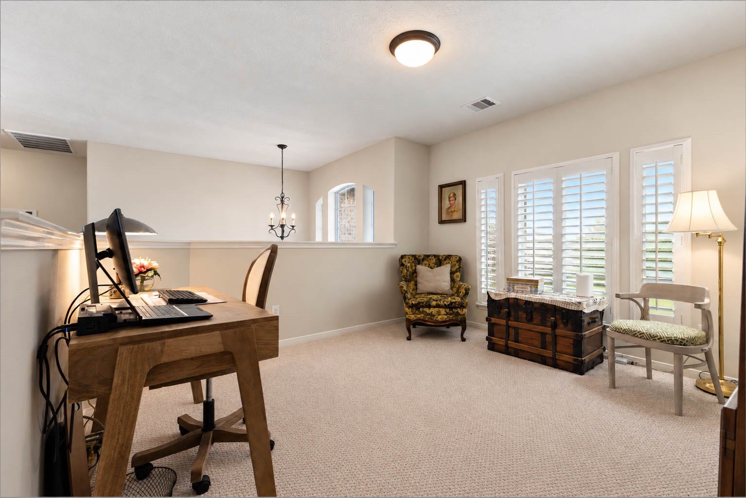 2532 Oak Dale Way, Seabrook, TX 77586 Another flex space just off the game room adapts easily to a home office, play room, or hobby area. A wall of windows dressed in plantation shutters brightens the room and looks out over the front yard.