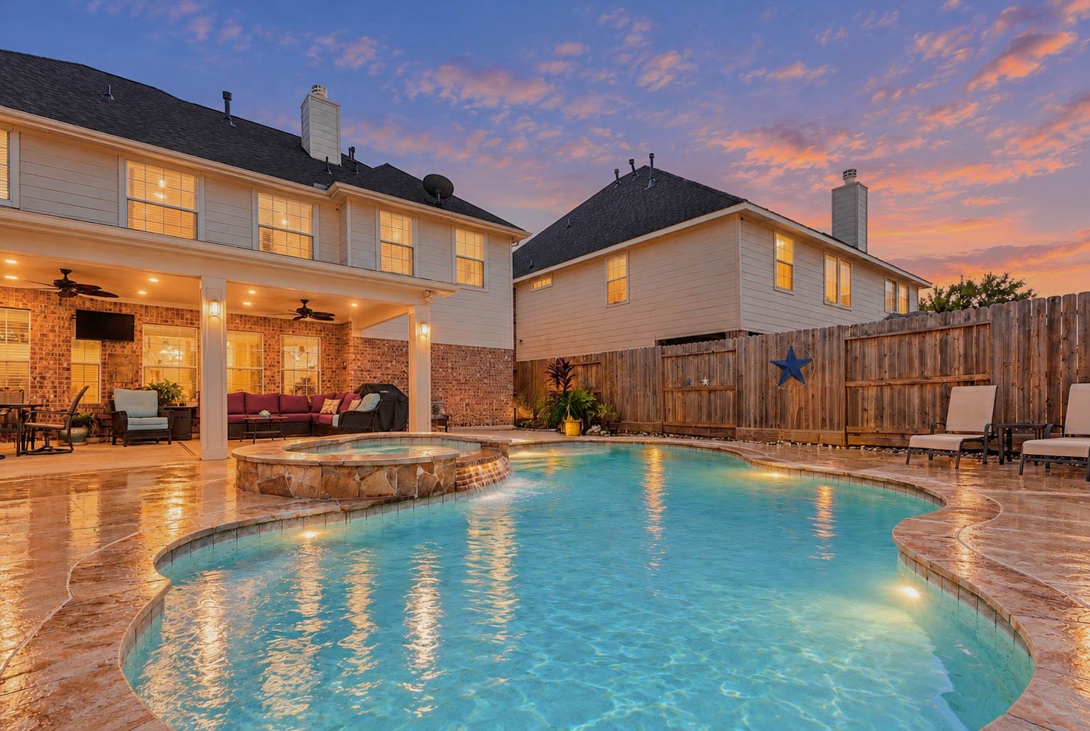 2532 Oak Dale Way, Seabrook, TX 77586 Even with the Kemah Boardwalk close by, this home makes it hard to leave! The backyard is a true retreat, featuring a sparkling pool and spa with a cascading waterfall feature, plus a spacious covered patio with ceiling fans and plenty of room to lounge and entertain.