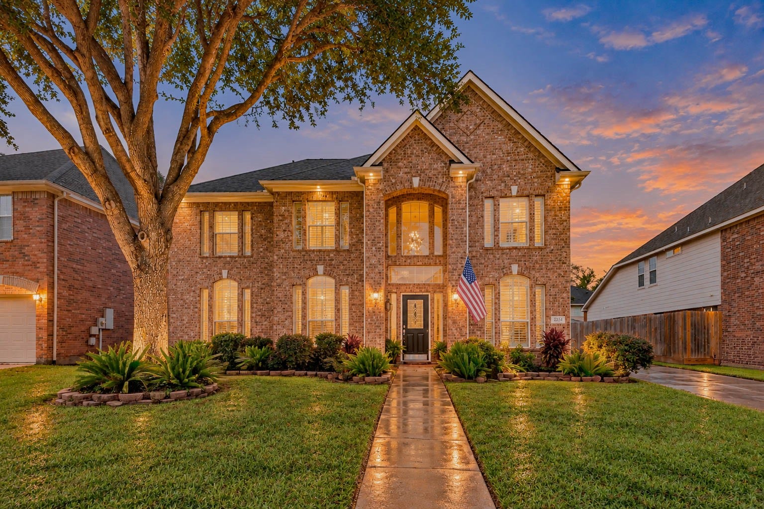 2532 Oak Dale Way, Seabrook, TX 77586 Welcome home to 2532 Oak Dale Way in Seabrook! This five bedroom, three and a half bath two story pairs classic brick curb appeal with arched windows and a beautifully landscaped front yard, all just a quick drive from the waterfront dining and entertainment of Kemah.
