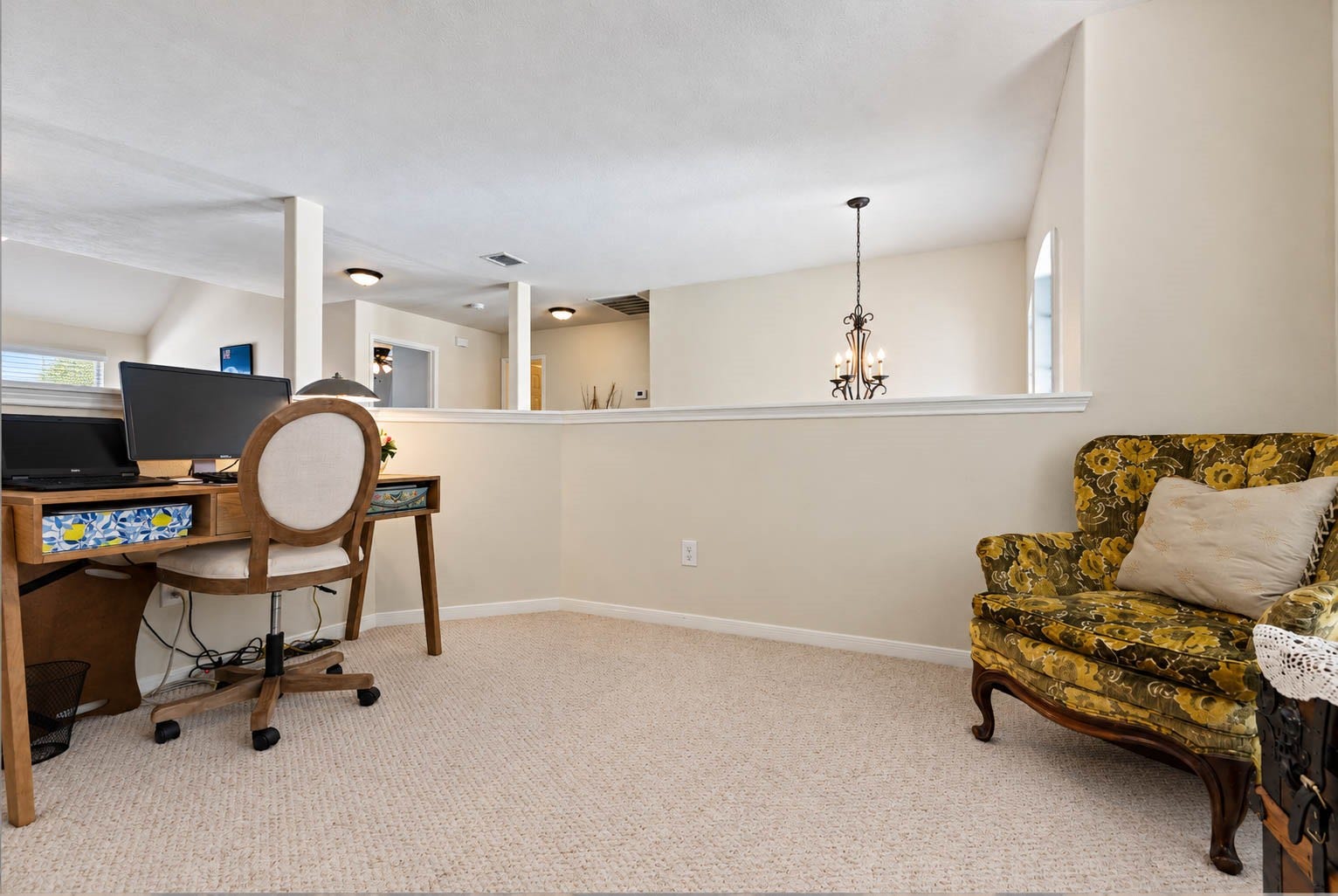 2532 Oak Dale Way, Seabrook, TX 77586 You also have a half wall opening to the level below that keeps the space airy.