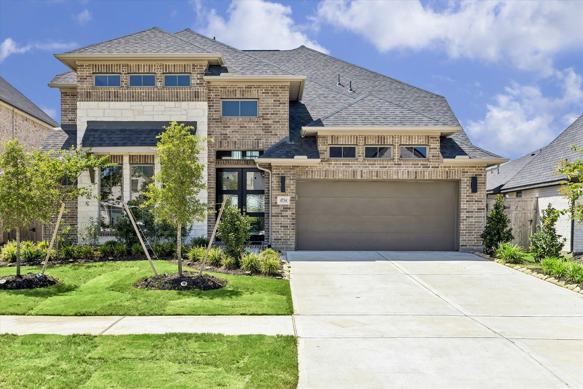 Stunning two-story brick and stone elevation
