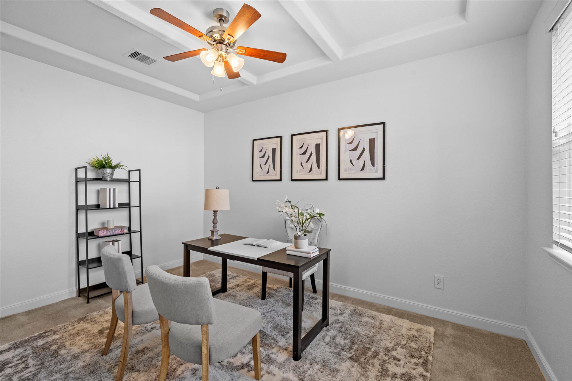 17315 Tomintoul Path, Richmond, TX 77407 A sophisticated private study featuring a sculpted tray ceiling, plush carpeting, and generous proportions ideal for an executive workspace or quiet retreat.