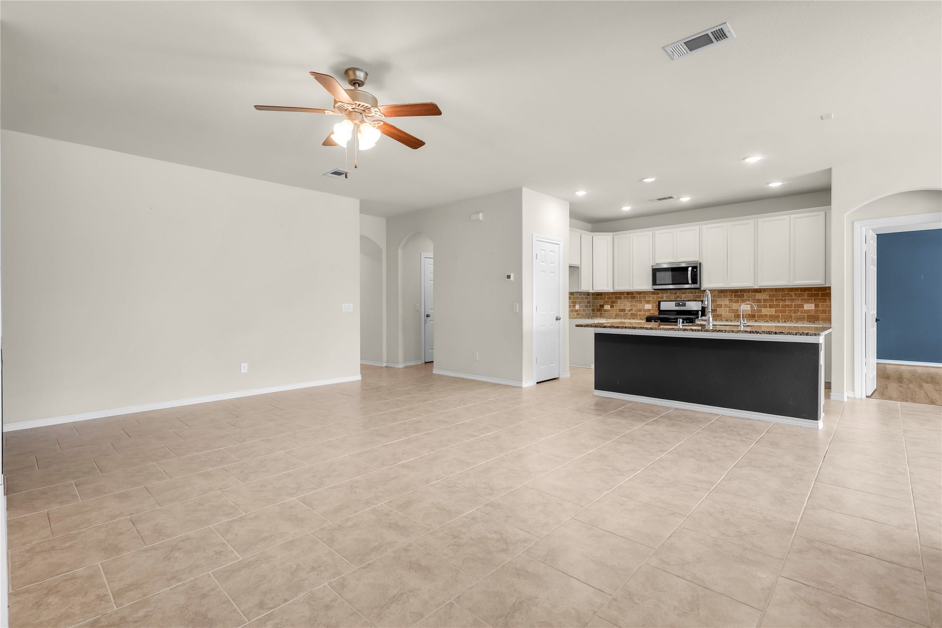 View of living area  to kitch open concept