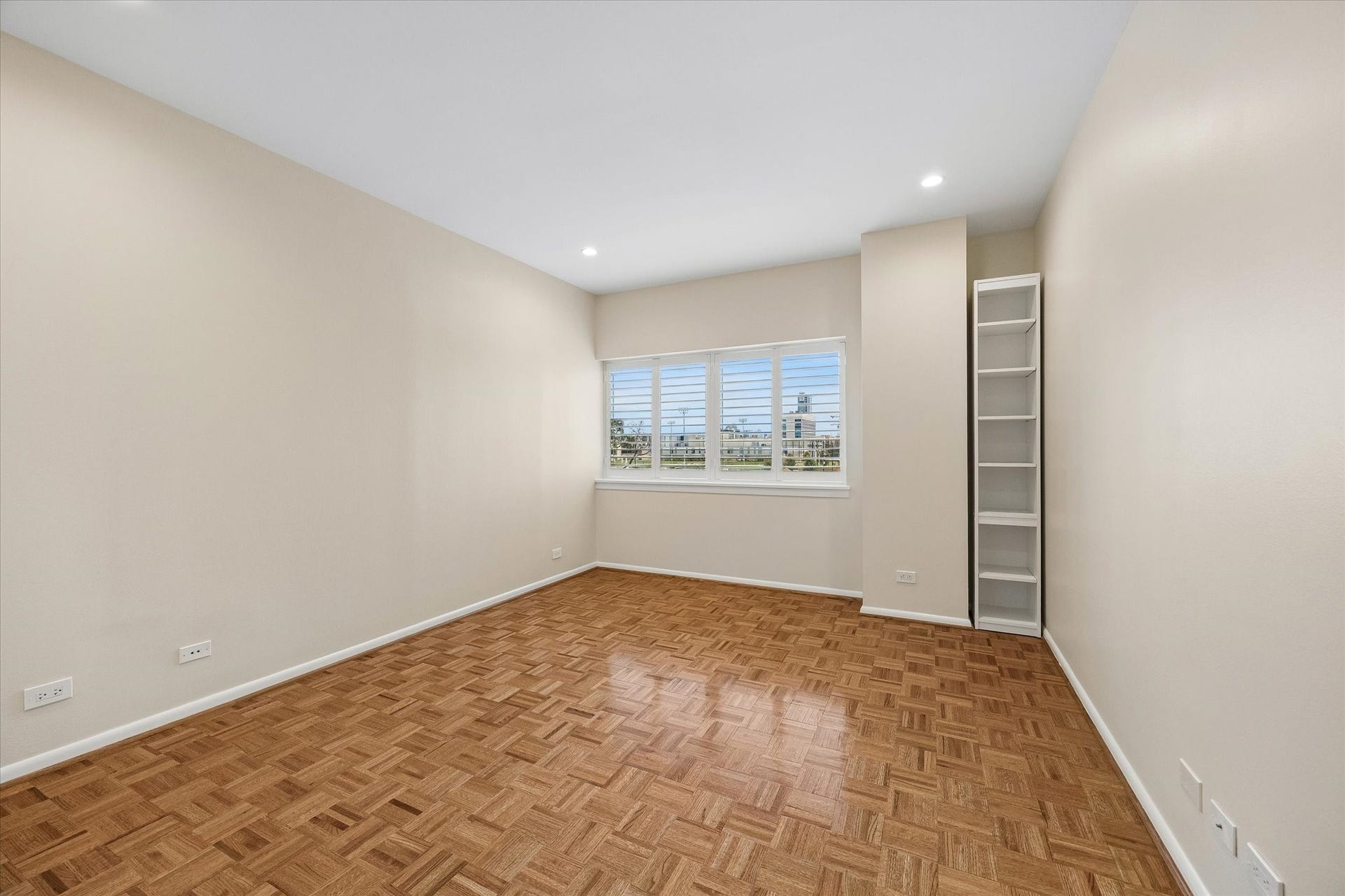 Large 3rd Bedroom (11.8 x 16.9) with plantation shutters