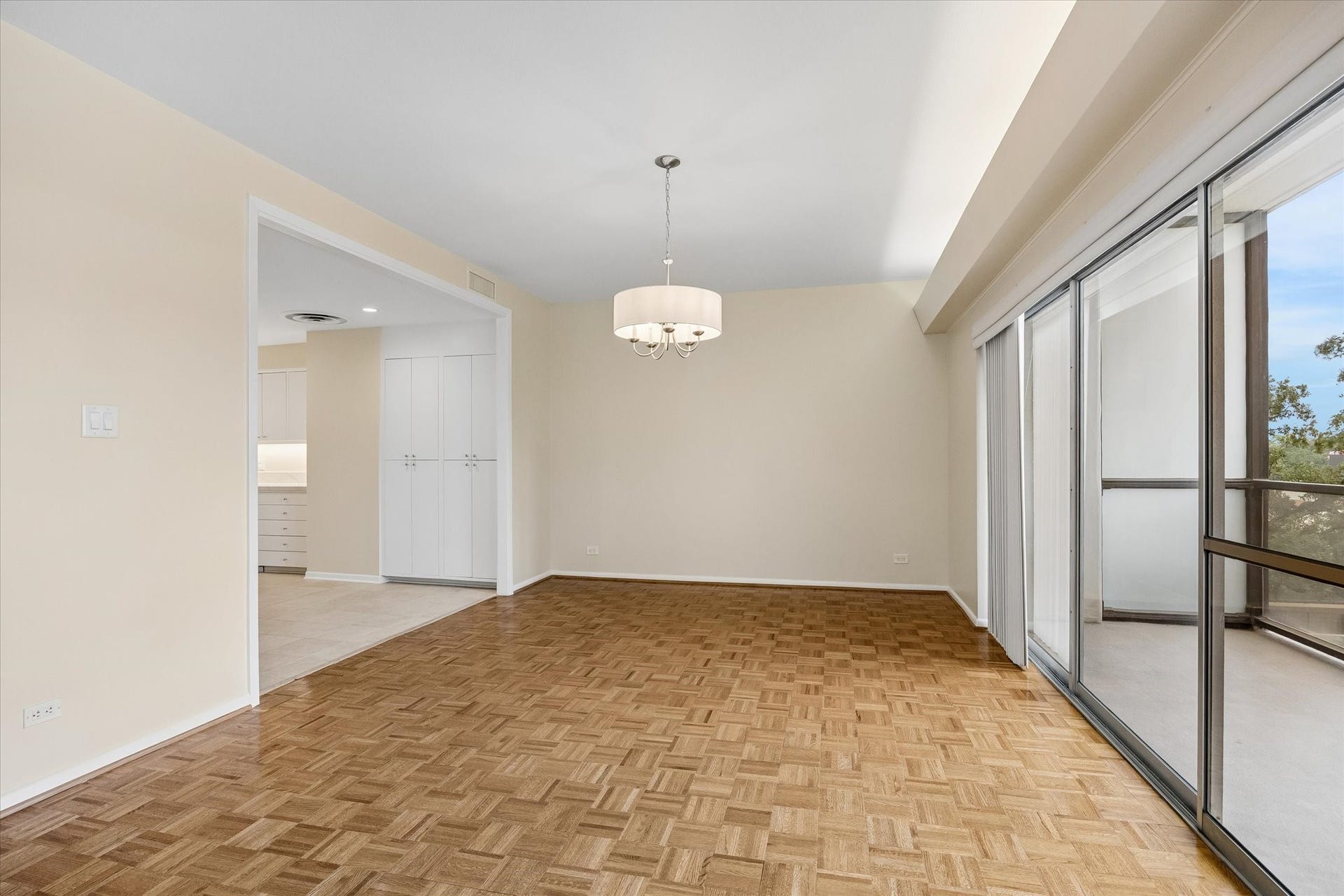 Dining Area (14.8 x 13.5) with parkay floors and balcony
