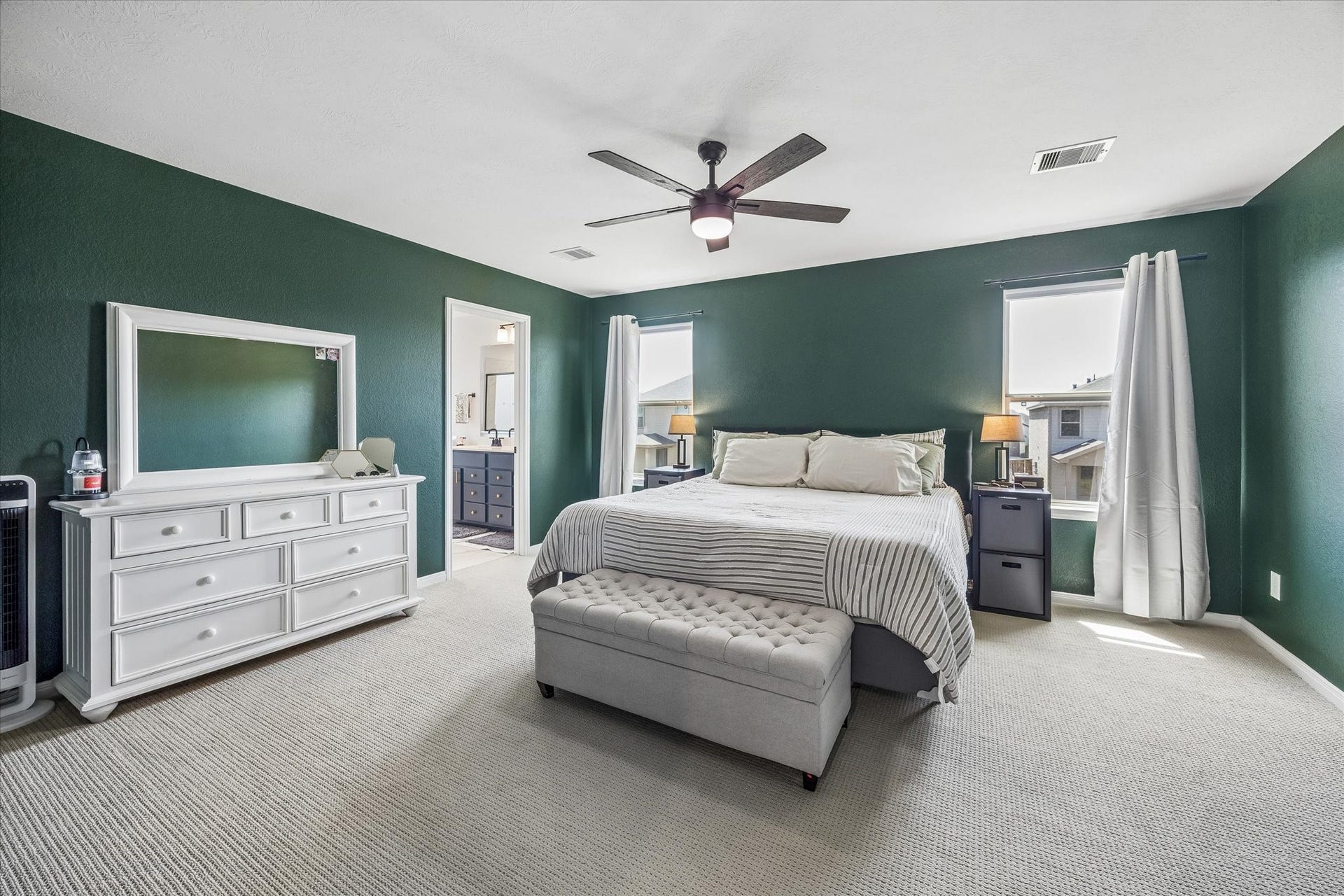 2852 Grand Anse Drive, Katy, TX 77493 Another view of the spacious primary retreat, highlighting the room's generous layout and direct access to the en-suite bath.