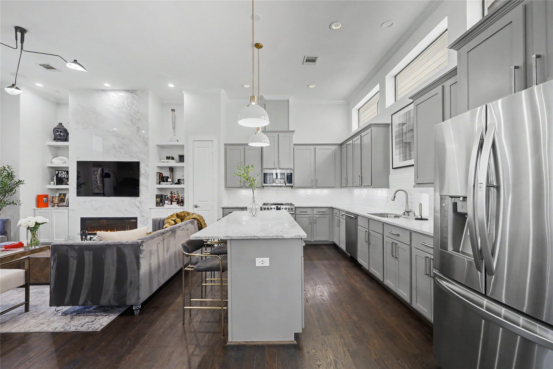 This incredible kitchen will impress the most discerning chef. Peek-a-boo windows above the cabinets for natural light.
