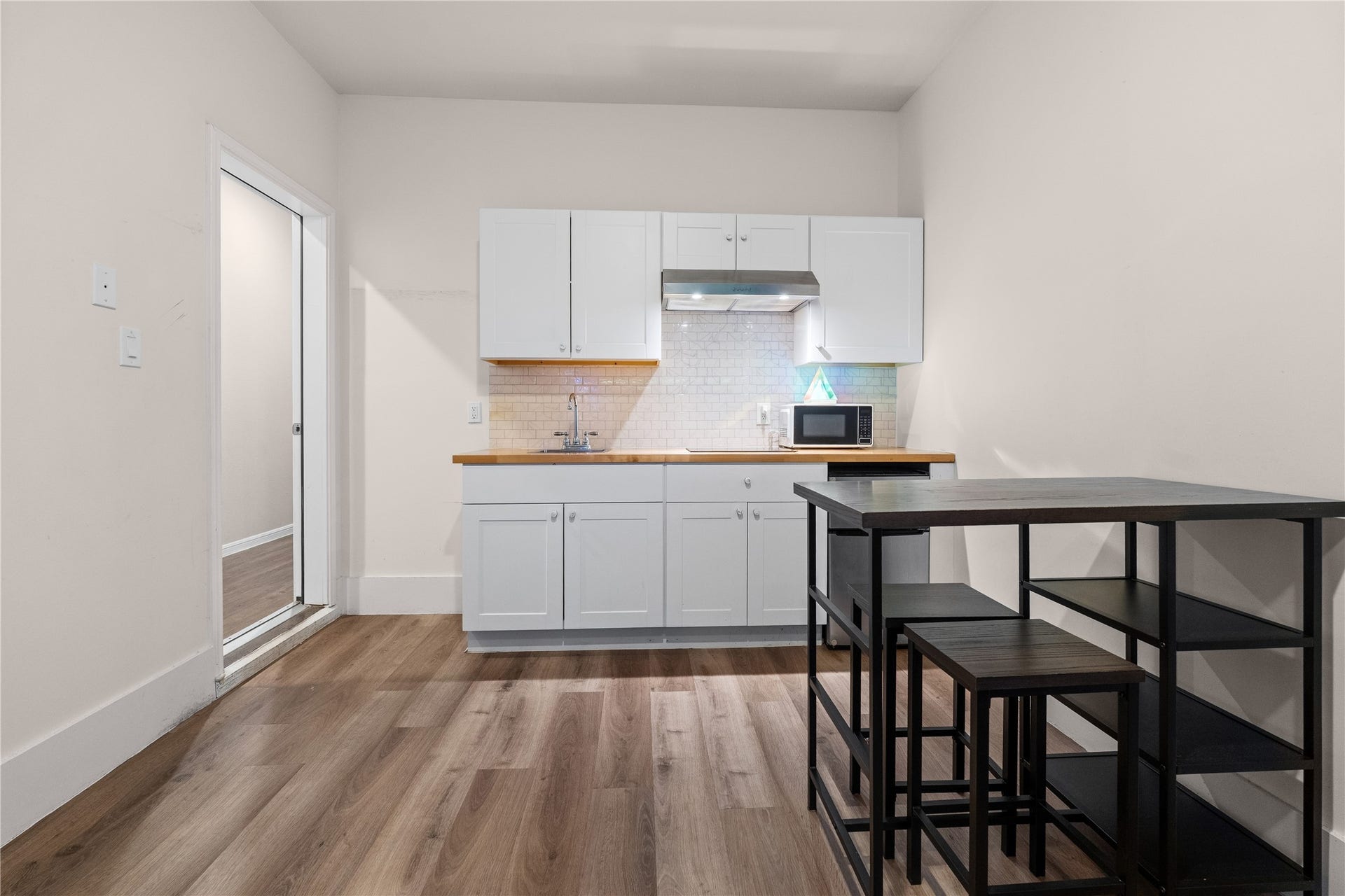 3603 Vineyard Lane, Pasadena, TX 77504 Garage turned into economy extra room, with mini kitchen.