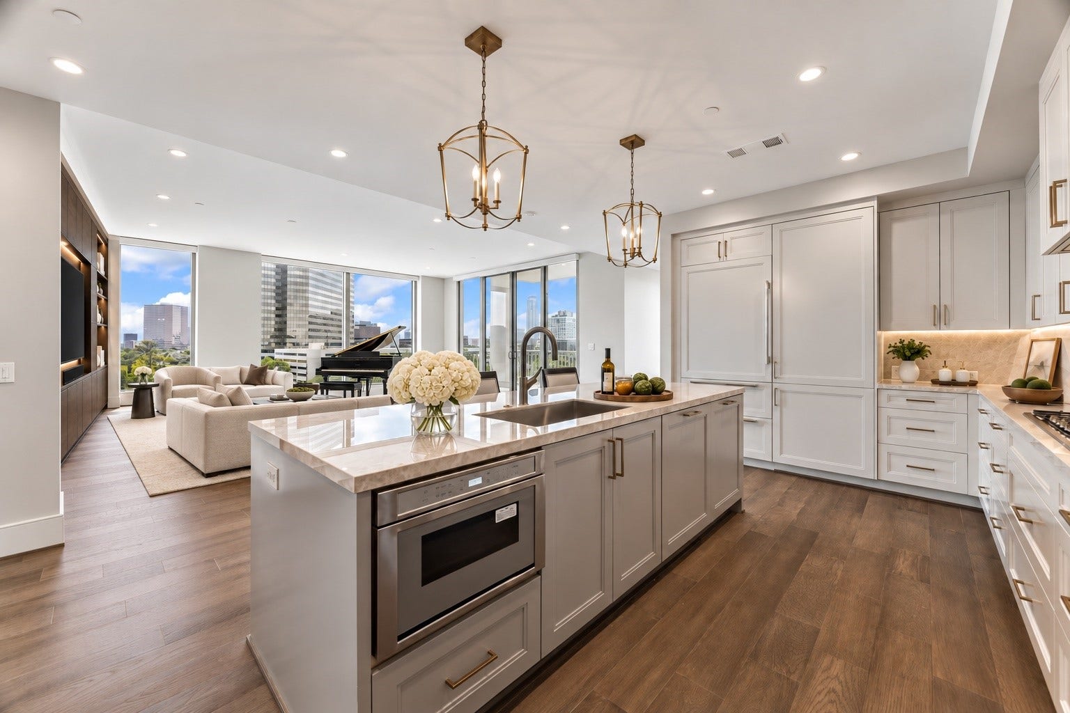 5656 San Felipe Street, Unit 701, Houston, TX 77056 The ideal entertainer's layout space perfectly blends kitchen with living room as you never miss a moment with your guests. Photo includes digitally staged areas of the living room to showcase the different options for funishing and decorating.