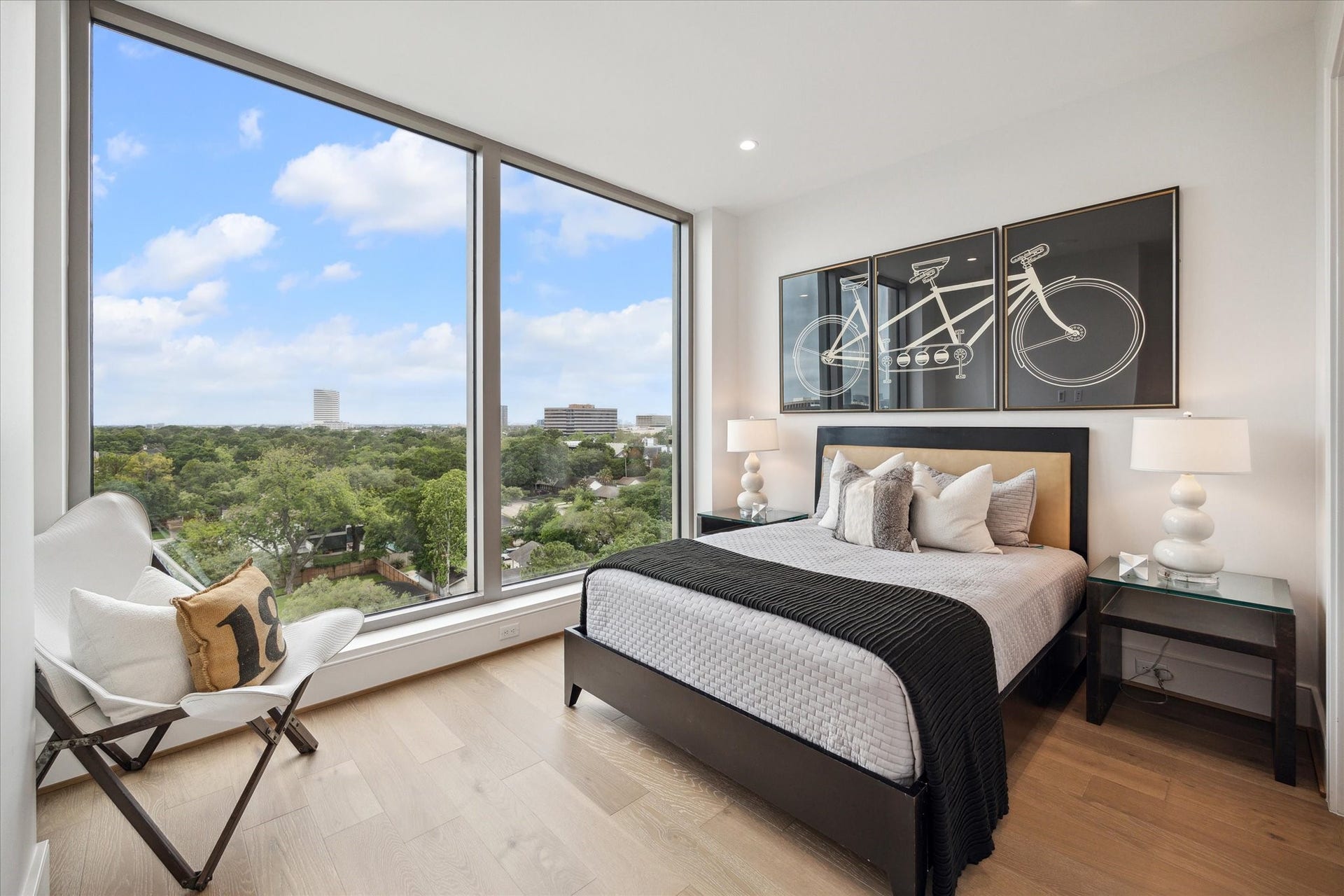 5656 San Felipe Street, Unit 701, Houston, TX 77056 Private En-suite guest bedroom with touch of a button motorized window shades, amazing tree top views and walk-in closet, all designed for your guest ultimate comfort and convenience. Photo of another unit with same layout