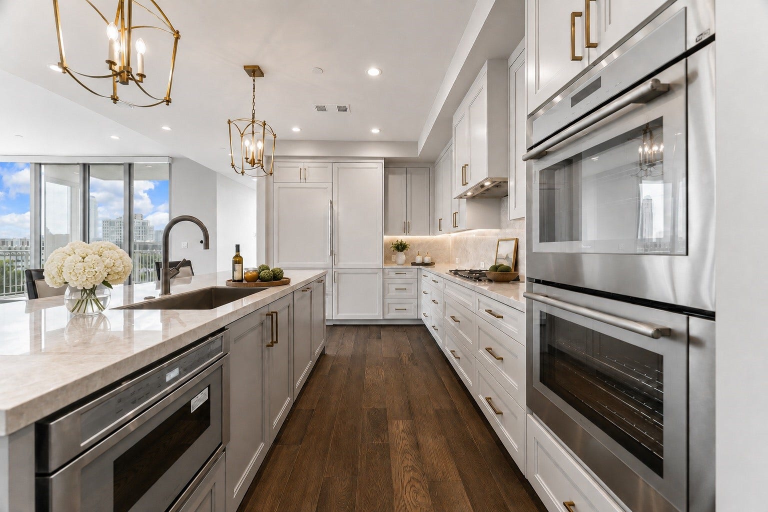 5656 San Felipe Street, Unit 701, Houston, TX 77056 Alternate view of this exceptionally designed kitchen offering ample storage space, impressive custom cabinetry and deep drawers. Premium appliances include double Thermador ovens and a built-in microwave. A practical kitchen as it is elgant.