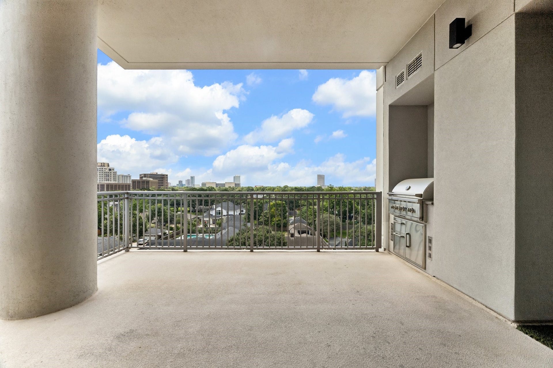 5656 San Felipe Street, Unit 701, Houston, TX 77056 Alternate view of the "Un-Staged" corner balcony offering plenty of room for outdoor dining, lounging and entertaining while enjoying the SouthEast views.