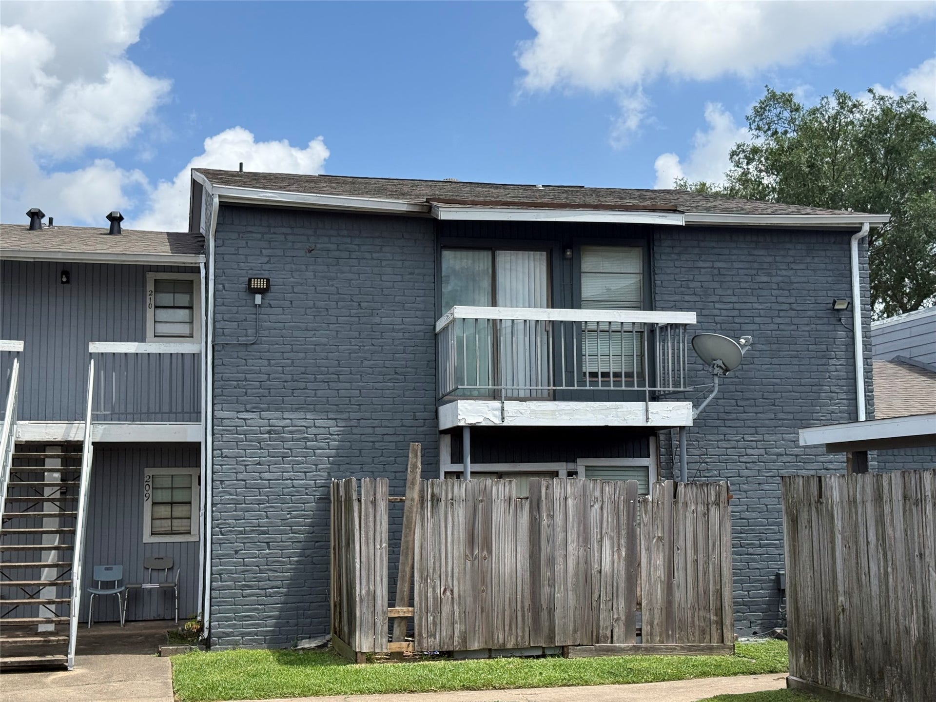 9550 Deering Drive, #210, Houston, TX 77036 Second story unit with balcony.